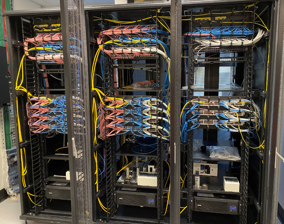 Figure 1 - A typical floor comms rack for the access layer – Cisco Stacks – Colour coded by device role